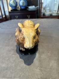 A fine Chinese cafe-au-lait glazed hare on wooden stand, Tian 天 mark, Qing