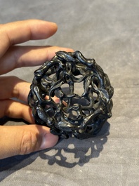 A Chinese famille rose cup with a boy and a rooster on wooden base, Qianlong mark, 20th C.