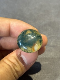 A Chinese yellow jade snuff bottle with moss agate cover and bone stopper, 19th C.