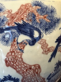 A fine Chinese blue, white and copper-red 'magpie and pine tree' vase, Yongzheng/Qianlong