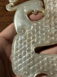 A Chinese nephrite jade ark-shaped 'chilong' plaque, Zhou/Han