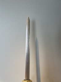 A silver plated dagger and four swords, China, Burma and Indonesia, 18/19th C.
