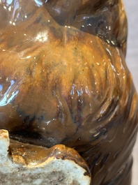 A fine Chinese cafe-au-lait glazed hare on wooden stand, Tian 天 mark, Qing