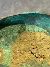 A Chinese archaic bronze tripod vessel and cover, 'ding 鼎', Eastern Zhou, Spring and Autumn period