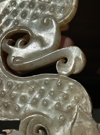 A Chinese nephrite jade ark-shaped 'chilong' plaque, Zhou/Han