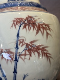 A fine Chinese blue, white and copper-red 'magpie and pine tree' vase, Yongzheng/Qianlong