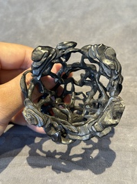 A Chinese famille rose cup with a boy and a rooster on wooden base, Qianlong mark, 20th C.