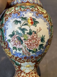 A Chinese Beijing enamel vase with floral design, 19/20th C.