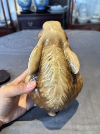 A fine Chinese cafe-au-lait glazed hare on wooden stand, Tian 天 mark, Qing