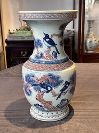 A fine Chinese blue, white and copper-red 'magpie and pine tree' vase, Yongzheng/Qianlong
