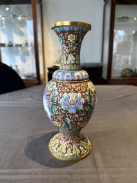 A Chinese Beijing enamel vase with floral design, 19/20th C.
