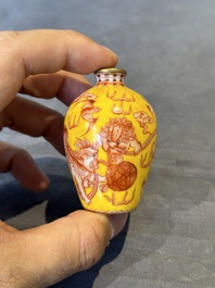 A Chinese jade snuff bottle and a yellow-ground iron-red snuff bottle, Daoguang mark, 19th C.