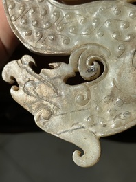 A Chinese nephrite jade ark-shaped 'chilong' plaque, Zhou/Han