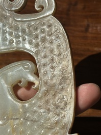 A Chinese nephrite jade ark-shaped 'chilong' plaque, Zhou/Han