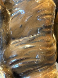 A fine Chinese cafe-au-lait glazed hare on wooden stand, Tian 天 mark, Qing