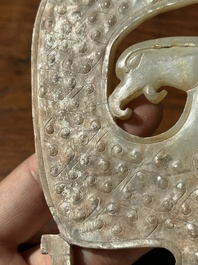A Chinese nephrite jade ark-shaped 'chilong' plaque, Zhou/Han
