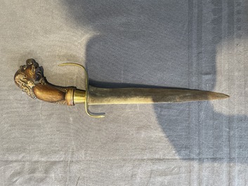 A silver plated dagger and four swords, China, Burma and Indonesia, 18/19th C.
