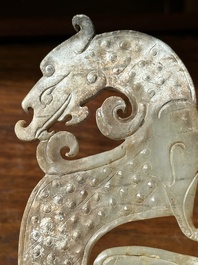 A Chinese nephrite jade ark-shaped 'chilong' plaque, Zhou/Han