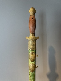 A silver plated dagger and four swords, China, Burma and Indonesia, 18/19th C.