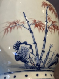 A fine Chinese blue, white and copper-red 'magpie and pine tree' vase, Yongzheng/Qianlong