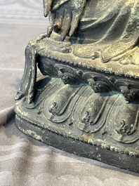 A large Chinese bronze sculpture of Bodhisattva on a lotus throne, Ming