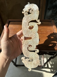 A Chinese nephrite jade ark-shaped 'chilong' plaque, Zhou/Han