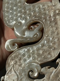 A Chinese nephrite jade ark-shaped 'chilong' plaque, Zhou/Han