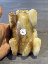 A large Chinese white and russet jade sculpture of a mythical beast, 17/18th C.