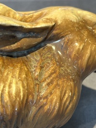 A fine Chinese cafe-au-lait glazed hare on wooden stand, Tian 天 mark, Qing