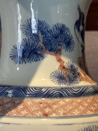 A fine Chinese blue, white and copper-red 'magpie and pine tree' vase, Yongzheng/Qianlong
