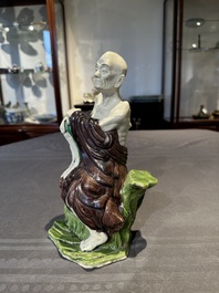A fine Chinese sancai-glazed figure of a Luohan, Qianlong