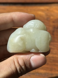 A Chinese white jade carving of a reclining camel, Qing