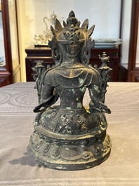 A large Chinese bronze sculpture of Bodhisattva on a lotus throne, Ming