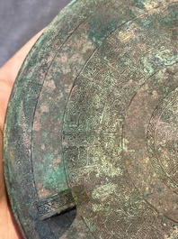 A Chinese archaic bronze tripod vessel and cover, 'ding 鼎', Eastern Zhou, Spring and Autumn period