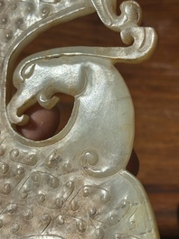 A Chinese nephrite jade ark-shaped 'chilong' plaque, Zhou/Han