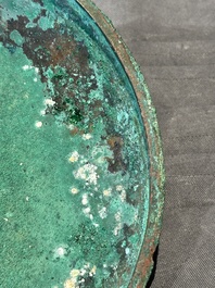 A Chinese archaic bronze tripod vessel and cover, 'ding 鼎', Eastern Zhou, Spring and Autumn period