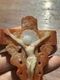 A Chinese white and red jade 'crucifix' pendant, 19th C.
