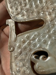 A Chinese nephrite jade ark-shaped 'chilong' plaque, Zhou/Han