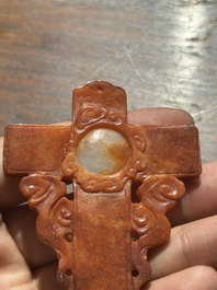 A Chinese white and red jade 'crucifix' pendant, 19th C.