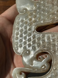 A Chinese nephrite jade ark-shaped 'chilong' plaque, Zhou/Han