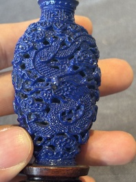 Five Chinese moulded famille rose snuff bottles, Qianlong mark, 19th C.