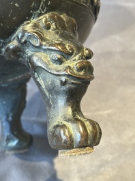 A large Chinese bronze censer and cover with a Buddhist lion, Ming