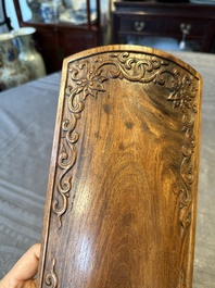 A Chinese Huanghuali wood coffin-shaped offering box and cover with mountainous landscape design, 17/18th C.