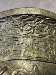 A Chinese bronze 'elephant' tripod censer and cover, Ming