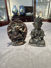 A Chinese bronze Guanyin, Ming and a Tibetan polychrome plaster relief, 19th C.
