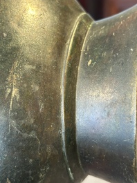 A Chinese silver-inlaid bronze arrow vase with Taotie design, 'touhu 投壺', Ming