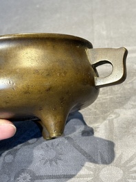 A Chinese bronze censer and stand, Xuande mark, 17th C.
