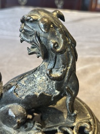 A large Chinese bronze censer and cover with a Buddhist lion, Ming
