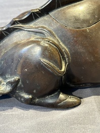 A fine Chinese bronze 'qilin' censer and cover, Ming