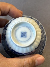 Five fine Chinese blue and white cups and saucers, 19th C.